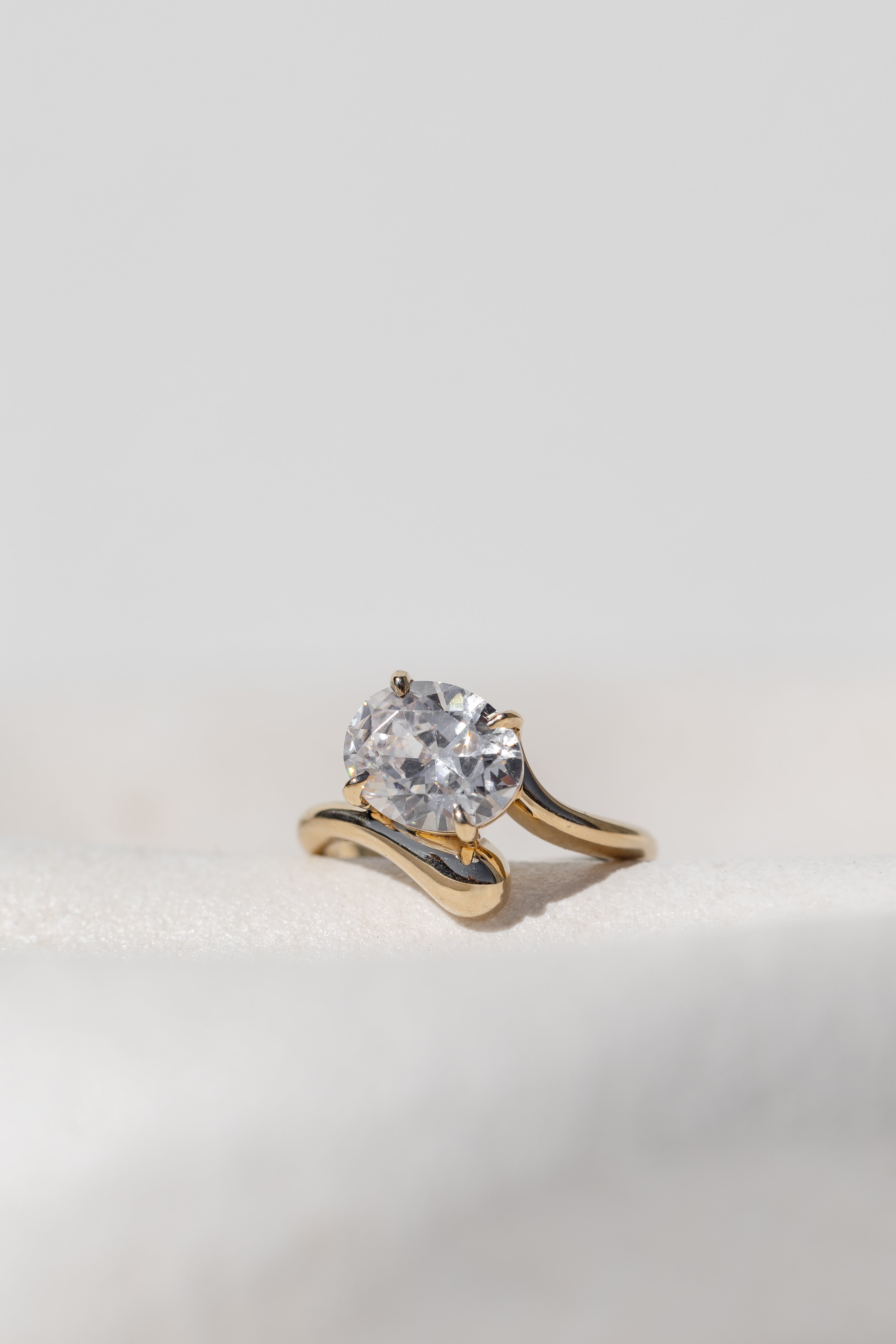 Floating Oval Solitaire Engagement Ring