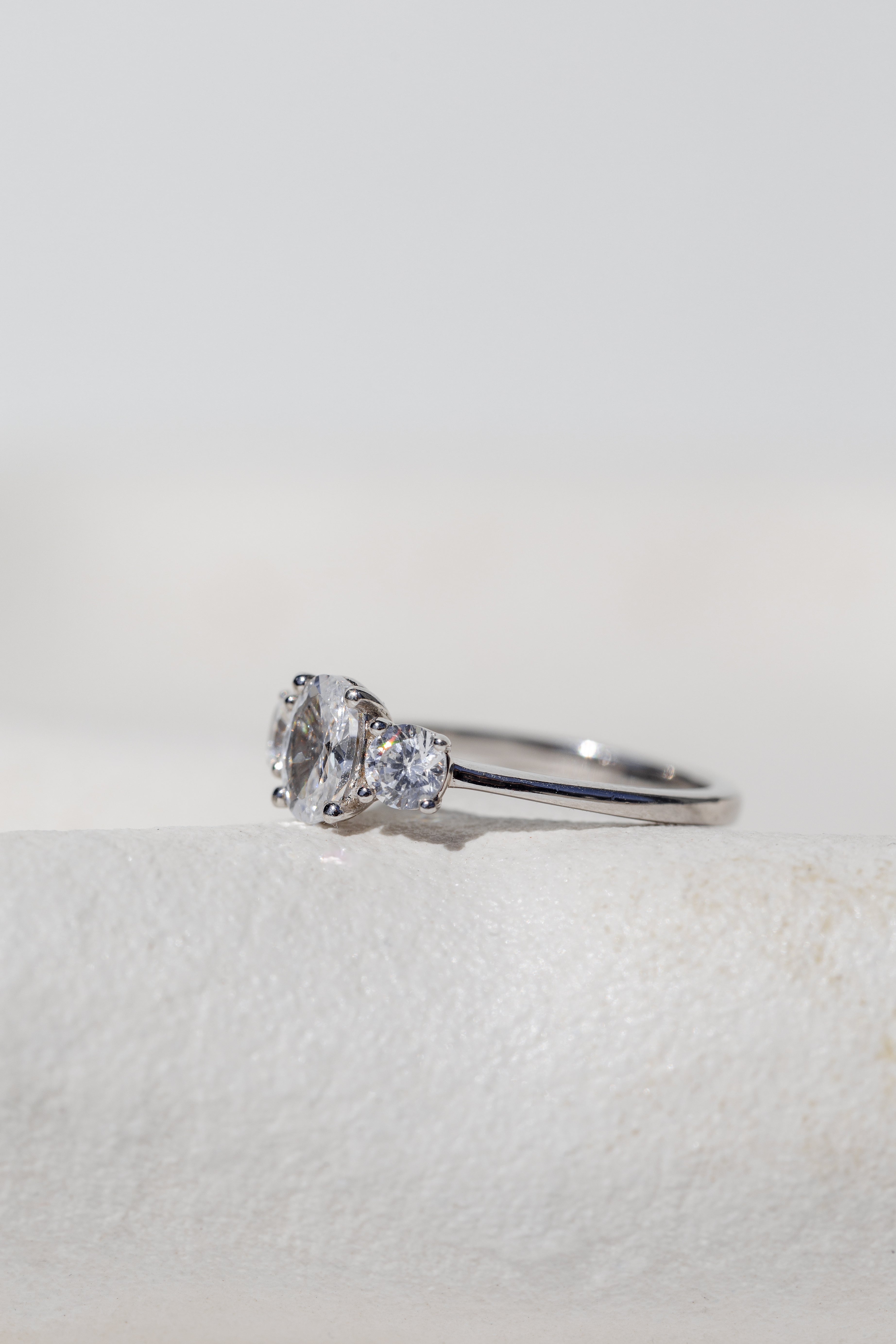 LAUREN OVAL WITH ROUNDS TRILOGY ENGAGEMENT RING