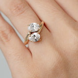 Toi et Moi diamond engagement ring with  a pear cut diamond and an oval cut diamond