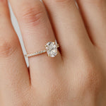 Oval Cut Diamond engagement ring with diamond band