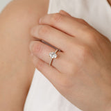 Oval Legacy engagement ring with diamonds in the band