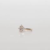 Three stone diamond engagement ring with marquise centre stone and half moon cut diamond side stones