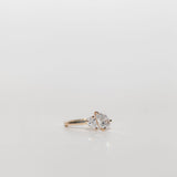 Toi et Moi Diamond engagement ring with one large pear cut diamond and one small pear cut diamond