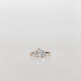 Toi et Moi Diamond engagement ring with one large pear cut diamond and one small pear cut diamond