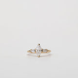 Trilogy three stone ring with marquise diamond centre