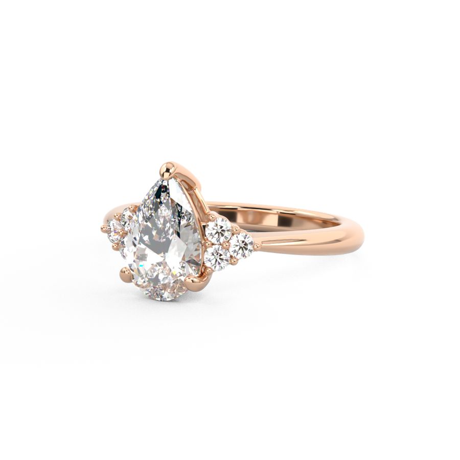 Alicia | Pear Shape diamond engagement ring with round diamond clusters