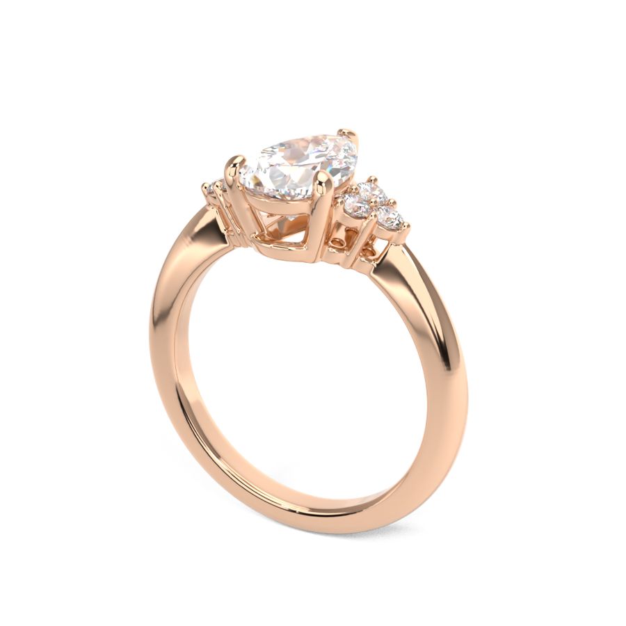Alicia | Pear Shape diamond engagement ring with round diamond clusters