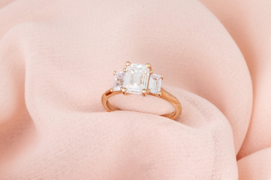 Angelica | Trilogy Ring featuring three emerald cut stones