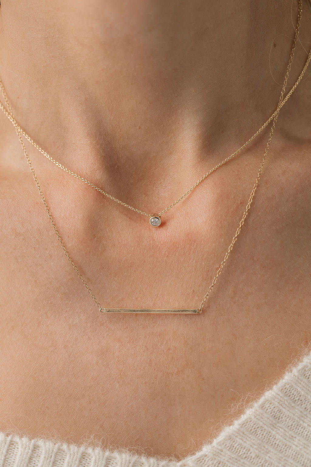 Gold bar necklace with bezel set diamond necklace
