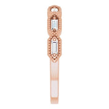 rose gold diamond eternity ring with baguette cut diamonds and millgrain edge
