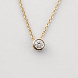 diamond bezel set necklace in 18kt gold