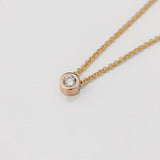 gold bezel set diamond necklace