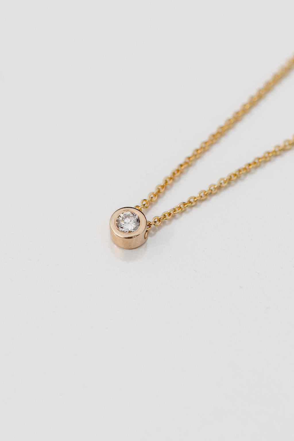 gold bezel set diamond necklace