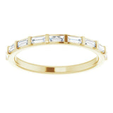 yellow gold eternity ring with baguette cut diamonds