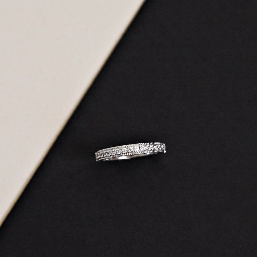 white gold diamond wedding ring with millgrain edge vintage style