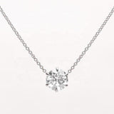 white gold claw set diamond pendant