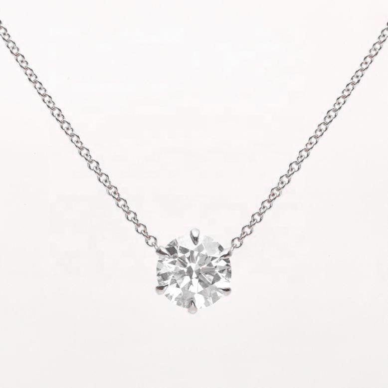 white gold claw set diamond pendant