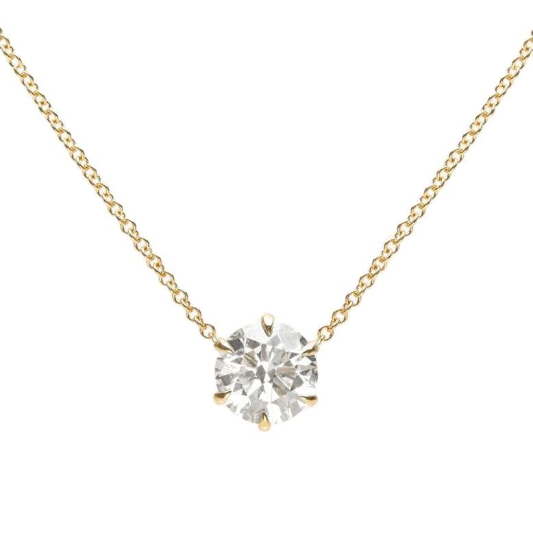 yellow gold claw set diamond pendant