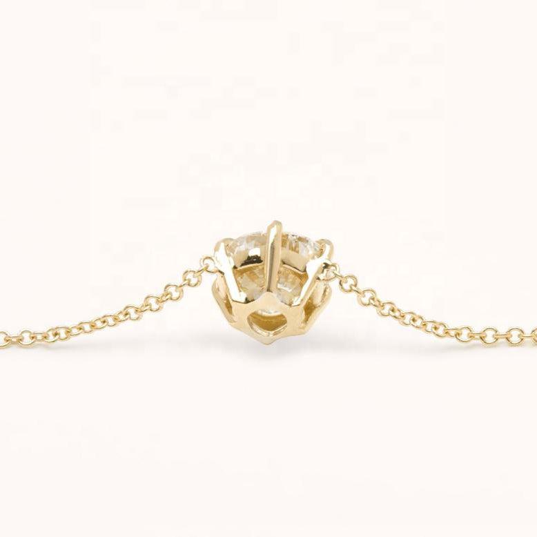 yellow gold claw set diamond pendant