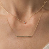 bezel set diamond necklace and gold bar necklace