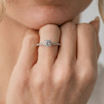 diamond engagement ring with fine diamond band