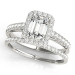 white gold engagement ring emerald cut moissanite centre with moissanite halo and moissanite on the band with moissanite wedding ring