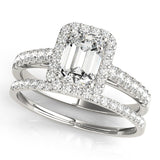 white gold engagement ring emerald cut moissanite centre with moissanite halo and moissanite on the band with moissanite wedding ring