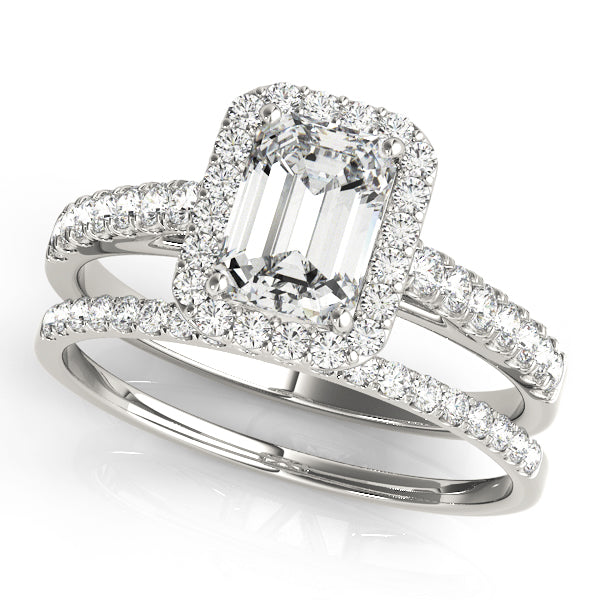 white gold engagement ring emerald cut moissanite centre with moissanite halo and moissanite on the band with moissanite wedding ring