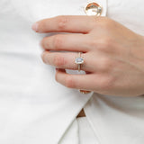 emerald cut diamond engagement ring with diamond band