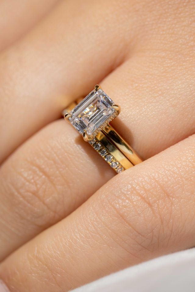 emerald cut solitaire diamond with hidden halo