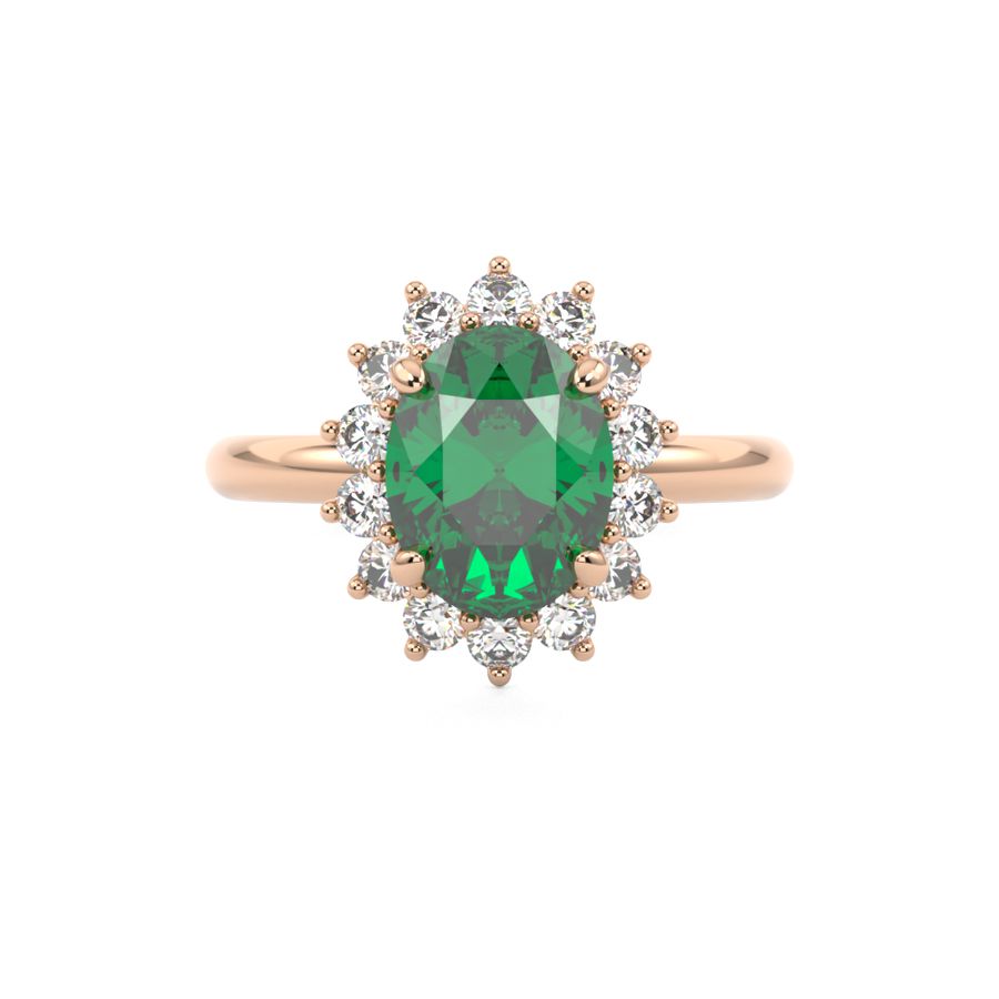 Emerald engagement ring with diamond halo