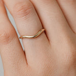 gold curved wedding ring
