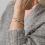the perfect gold bangle and tennis bracelets