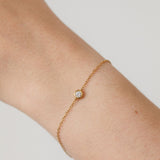 Diamond bezel gold bracelet
