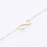 yellow gold infinity bracelet