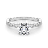 Ivy - Round Brilliant Centre set on a vintage style diamond band