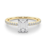 Legacy Emerald Cut | A stunning emerald cut centre diamond set upon a fine diamond band