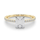 yellow gold emerald cut moissanite on a fine moissanite band