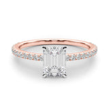 rose gold emerald cut moissanite on a fine moissanite band