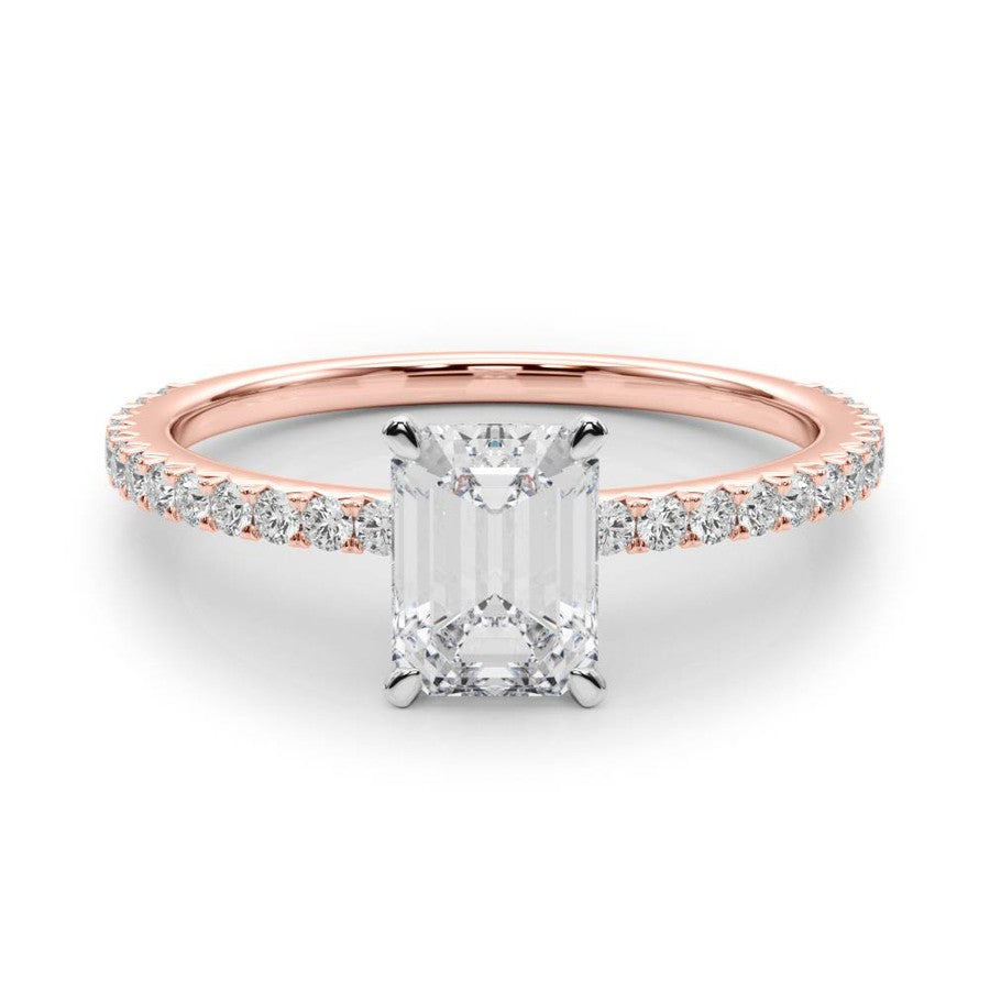 rose gold emerald cut moissanite on a fine moissanite band