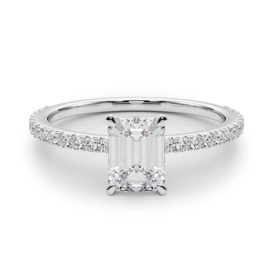 white gold emerald cut moissanite on a fine moissanite band