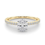 yellow gold oval shape moissanite engagement ring with fine moissanite band