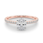 rose gold oval shape moissanite engagement ring with fine moissanite band