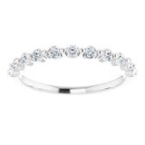 white gold diamond wedding ring with single claws and round diamonds