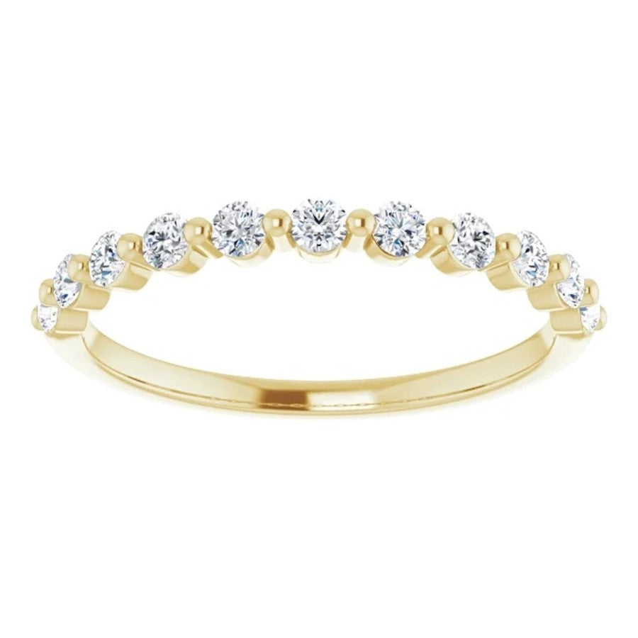 yellow gold diamond wedding ring with single claws and round diamonds