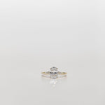 oval cut diamond engagement ring with diamonds on the band