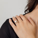 oval solitaire engagement ring with channel set diamond wedding ring