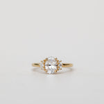 oval cut diamond engagement ring with side stones