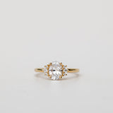 oval cut diamond engagement ring with side stones