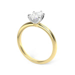 yellow gold pear shape diamond solitaire engagement ring with white gold claws